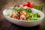 Meat Skewers on wooden table